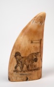 A pair of scrimshaw whale's teeth with animal decoration, 9.5cm high. - 2