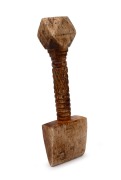 An antique carved whalebone sail seam rubber, 19th century, 15cm long.