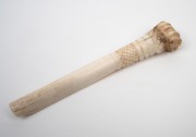 An antique carved whalebone apple corer carved with sweetheart and initials "F.I.", 19th century, 14.5cm long. - 2