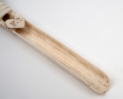An antique carved whalebone apple corer carved with sweetheart and initials "F.I.", 19th century, 14.5cm long. - 4