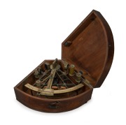 An antique English brass sextant in original mahogany case, 19th century, ​​​​​​​the case 29cm high.