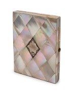 An antique mother of pearl calling card case with sterling silver cartouche, interior attractively fitted with compartments, water washed blue silk and gilt edged card, 19th century, 10.5cm wide.