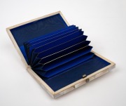An antique mother of pearl calling card case with sterling silver cartouche, interior attractively fitted with compartments, water washed blue silk and gilt edged card, 19th century, 10.5cm wide. - 2