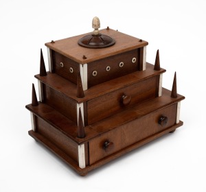 An Australian folk art cotton reel sewing tidy crafted from cedar and pine with whalebone finial and trim, 20th century, 23cm high, 25cm wide, 17cm deep.