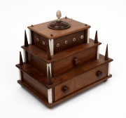 An Australian folk art cotton reel sewing tidy crafted from cedar and pine with whalebone finial and trim, 20th century, 23cm high, 25cm wide, 17cm deep.