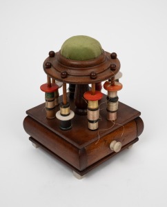 An Australian cedar folk art cotton reel sewing tidy with whale bone fittings, 19th/20th century, 18cm high.