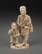 An antique Japanese carved ivory and bone okimono figural group, Meiji period, 19th/20th century, ​​​​​​​16cm high.