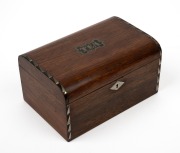 An antique English rosewood tea caddy with inlaid decoration, interior fitted with two lidded compartments with whalebone knobs, mid 19th century, 10cm high, 19cm wide, 13cm deep.
