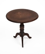 A miniature Georgian style tilt top wine table, 19th/20th century, 16cm high, 17cm diameter.