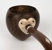 An antique maritime folk art dipping ladle, handsomely crafted from whalebone, coconut, hardwood and pearl shell, attractively finished with love heart decoration where the bowl and the shaft join, 19th century, ​​​​​​​38cm long. - 2
