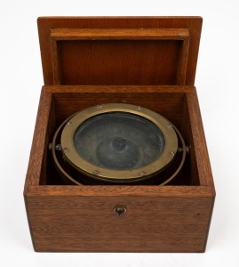 A vintage wet compass with brass gimbal mounts in Tasmanian oak box, early 20th century, 10.5cm high, 19cm wide, 20cm deep.