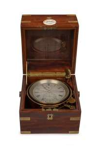 J. BLOUT THOMAS antique English chain fusee 56 hour marine chronometer with silvered dial, subsidiary seconds dial, housed in a three tier mahogany case with brass gimbal mounts,19th century, the case 19cm high.