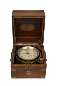 ULYSSE NARDIN antique 56 hour chain fusee marine chronometer housed in a three tier brass bound mahogany case, 19th/20th century, 19cm high.