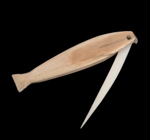 An antique pocket toothpick in the form of an elephant seal, 19th century, 6.2cm long when closed.