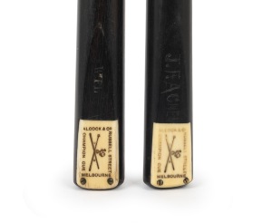 Pair of c. 1910s Alcock & Co. Melbourne "Champion Cues" (1st edition); ash shafts, ebony butts, ivory plates; one 58 inches long, the other 55 inches.
