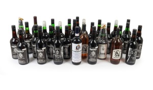 COLLINGWOOD: A collection of souvenir commemorative Copeland Trophy port bottles, spanning the years 1988 to 2011, together with seven other similar club bottles. (31 items)