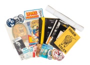 An accumulation of VFL/AFL ephemera, including twelve 1970s-80s official Richmond Tigers publications, five cloth badges (Geelong), four different 1975 Ampol "Team Mascot Car Stickers", a c. 1980s VFL "Lions Funmobile" paper hanging mobile (still in packa