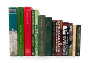 CRICKET BOOKS: A shelf of mostly hardcover editions, including noted "Ken Kelly Cricket Reflections - Five Decades of Cricket Photographs" by David Lemmon [Melbourne, 1985], "Barclays World of Cricket" by E.W. Swanton [Sydney, 1986], "Pageant of Cricket" 