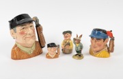 ROYAL DOULTON: A group of golf ceramics comprising 1970 D6623 "Golfer", 1970 D6757 "Golfer", 1984 DB32 "Bogey Bunnykins", 1985 D6740 "The Golfer", and 1997 D7064 "The Golfer"; the tallest 20cm. (5 items)