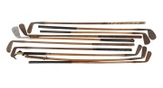 A group of early-20th century hickory-shafted golf clubs; designations include mid iron, 2-iron, mashie niblick, and deep face mashie; origins include Dovercourt, Glasgow, and Kinghorn. (10 items)