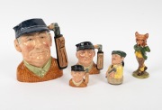 ROYAL DOULTON: A group of golf ceramics comprising 1970 D6623 "Golfer", 1970 D6756 "Golfer", 1970 D6757 "Golfer", 1985 D6740 "The Golfer", and 1999 SC5 "A Round with Foxy"; the tallest 20cm. (5 items)
