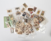 CIGARETTE & TRADE CARDS: An accumulation in mixed condition contained in a Jack Daniels whisky tin. Noted cricket, football, horse racing, (qty).