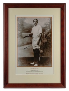 DON BRADMAN: Original signature in permanent marker on photograph print issued by the Bradman Museum, titled "Bowral Cricket Club c. 1926"; framed and glazed, 63 x 46cm overall.
