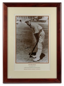 DON BRADMAN: Original signature in permanent marker on photograph print issued by the Bradman Museum, titled "New South Wales c. 1927"; framed and glazed, 63 x 46cm overall.