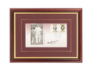 DON BRADMAN: A pair of attractively framed and glazed Donald Bradman commemorative first day covers, each featuring an original Bradman signature in permanent marker; the larger 45 x 34cm overall with Bradman Museum CoA verso. (2 items) - 2