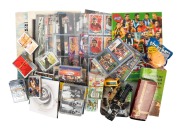 COLLECTION REMAINDER: A diverse accumulation of items including a quantity of AFL cards (Select, Cazaly Classics, Official AFL), several Star Trek, James Bond, and basketball cards, a stack of phone cards, some books, a gold-plated fountain pen, and more.