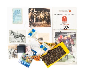 An accumulation of horse-racing ephemera, some signed (Phar Lap jockey Billy Elliot, Scobie Breasley, and others), plus Hong Kong Jockey Club tie and cufflink set, both in maker's box. (qty.)