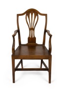 An antique English oak and elm provincial Hepplewhite armchair, 18th century, 103cm high, 58cm across the arms.