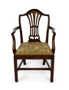 An antique English mahogany framed Hepplewhite armchair, 18th century, 99cm high, 62cm across the arms.