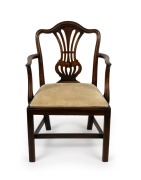 An antique English mahogany Hepplewhite armchair with fretted back splat and drop in seat, 18th century, 93cm high, 60cm across the arms.