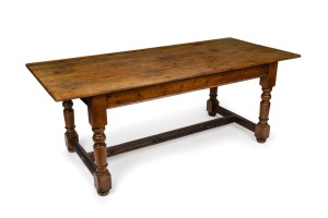 A Baltic pine scullery table with turned legs and stretcher base, South Australian origin, 76cm high, 198cm wide, 90cm deep.