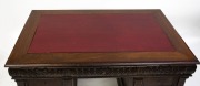 An antique French walnut twin pedestal desk with red leather insert top and Ionic carved pilasters, 19th century, 82cm high, 137cm wide, 86cm deep. - 2