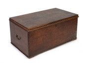 An antique Australian cedar blanket box with exposed dovetail construction and brass bale carrying handles, 19th century, ​​​​​​​41cm high, 89cm wide, 51cm deep.