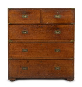 An antique mahogany two part military campaign chest with flush fitted handles and brass capped corners, standing on block feet, 19th century, 96cm high, 83cm wide, 46cm deep.