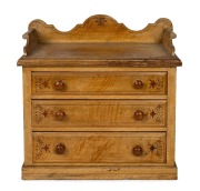 An antique Scandinavian chest of three drawers with gallery top and original hand-painted simulated grain finish, 19th century, ​​​​​​​84cm high, 85cm wide, 44cm deep.