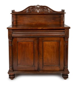 A Colonial Australian cedar chiffonier with ogee moulded full length drawer, panelled doors, turned split columns and Thomas Hope scroll back, circa 1845, 144cm high, 116cm wide, 56cm deep.