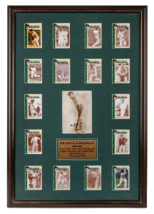DON BRADMAN: Display incorporating a photograph signed in permanent marker by Bradman, surrounded by a full set of Weet-Bix "Sir Donald Bradman Greatest Hits" trading cards; framed and glazed, 72 x 49cm overall.