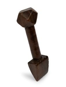 An antique carved timber sail seam rubber, 19th century, 16cm long.