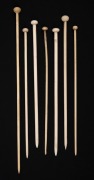 Seven assorted antique whalebone knitting needles with turned finial tops, 19th century, ​​​​​​​the largest 28cm long.