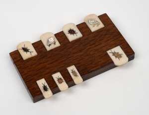 An antique Japanese Shibayama whist scoreboard, Meiji period, 19th/20th century, ​​​​​​​9.5cm wide.