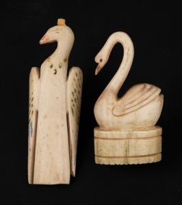 Two antique carved whalebone bird ornaments, one with remains of polychrome finish, 19th century, ​​​​​​​12.5cm and 9.5cm high.
