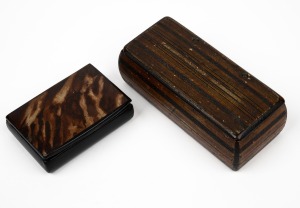 Two antique papier-mâché pocket snuff boxes with hand-painted finishes, early to mid 19th century, 10.5cm and 7cm wide.