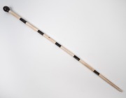 An antique walking stick with turned timber top and whalebone and baleen shaft, 19th century, ​​​​​​​94cm high. - 2