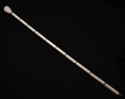 An antique whalebone and baleen walking stick with brass ferrule, 19th century, 86cm high. - 2