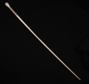 An antique walking stick with whale tooth top, whalebone shaft and baleen spacers, 19th century, ​​​​​​​83cm high. - 2