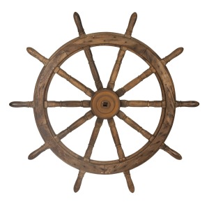 An antique iron bound teak ship's wheel, 19th/20th century, 139cm diameter.